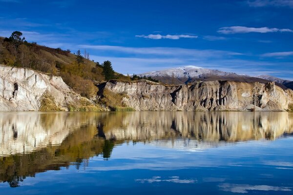 Landscape. Reflection of the cliff in the water