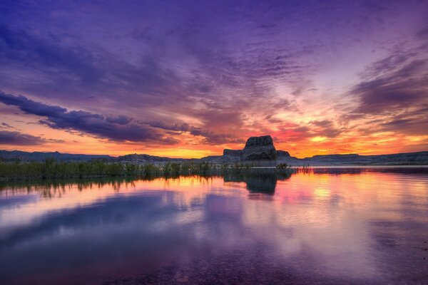 Reflection of the sunset sky in lake water