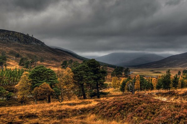 Autumn landscape of mountains and sky