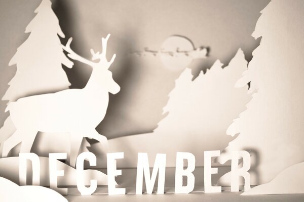 New Year s composition made of paper with deer and Christmas trees