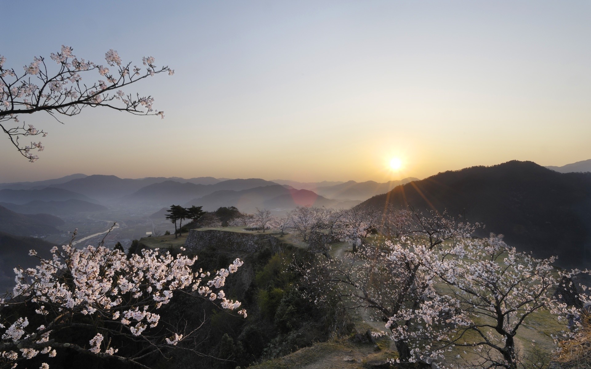 printemps paysage arbre aube coucher de soleil ciel nature soleil montagnes voyage à l extérieur lumière beau temps brouillard crépuscule scénique fleur