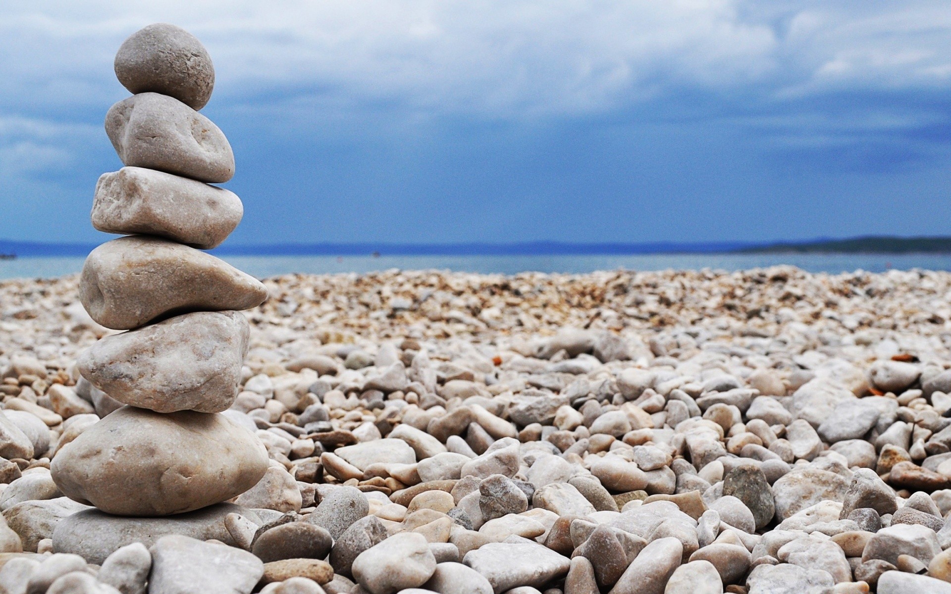 lake beach rock sea zen boulder water seashore nature stone sand ocean composure smooth sky balance relaxation stability harmony meditation