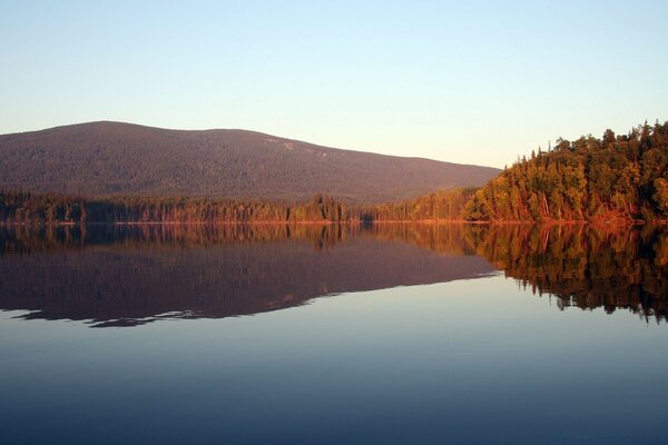 Reflection of the landscape in calm waters