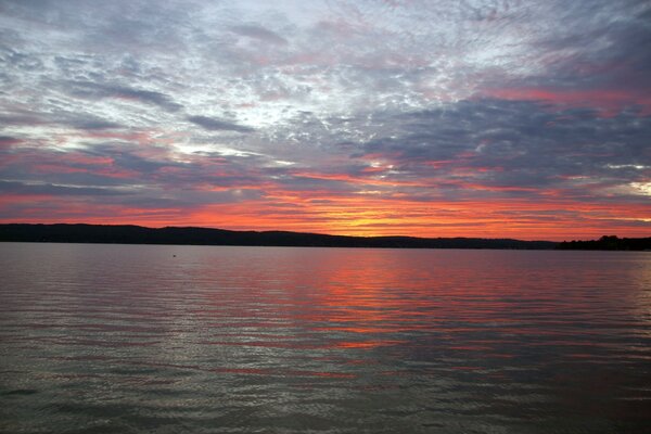 SUNSET TWILIGHT ENVELOPS THE LAKE