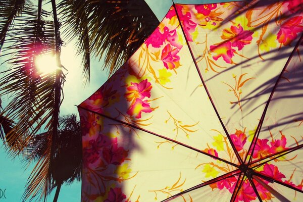 Summer beach holidays under an umbrella