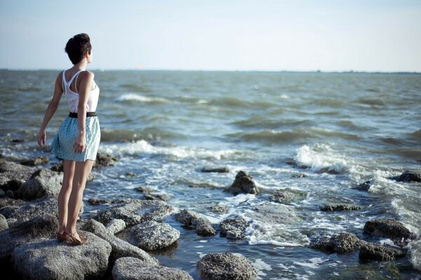 Stone beach at the foot of the ocean