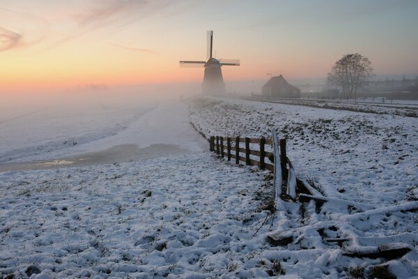 Snowy road leading to the mill