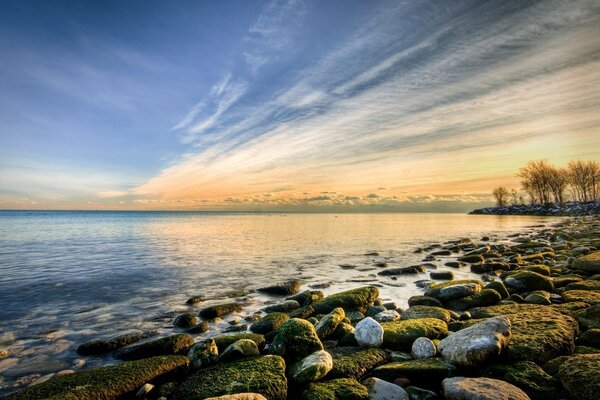 Peaceful sunset on a rocky beach