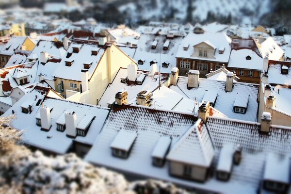 Winter snow on the roofs of houses clean air