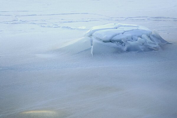 Swollen ice on a winter lake