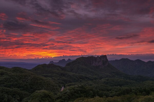 Breathtaking view from the mountains to the crimson sunset