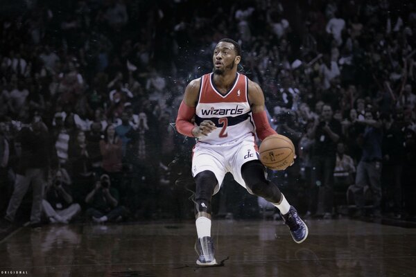 Photo of a basketball player in motion with a ball