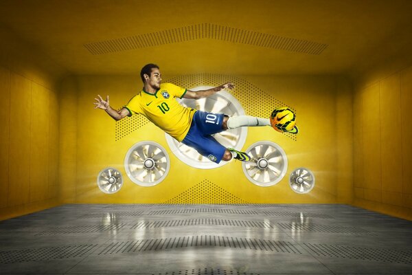 在跳跃中带球的足球运动员。 汽车轮辋