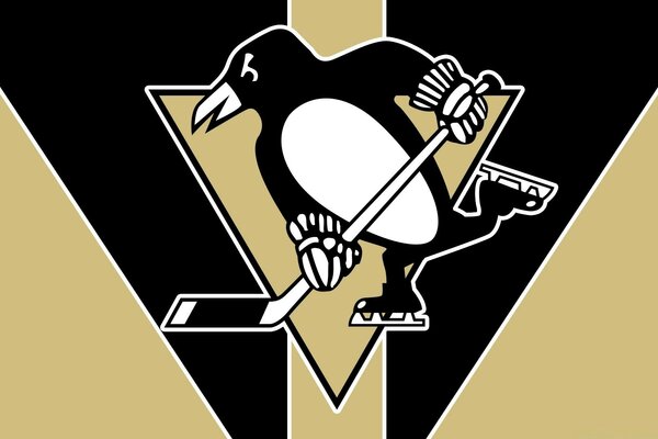 Penguin-hockey player with a stick