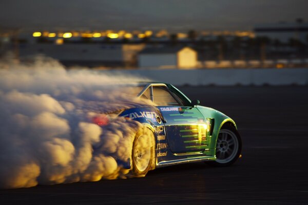 Sports car in smoke at speed