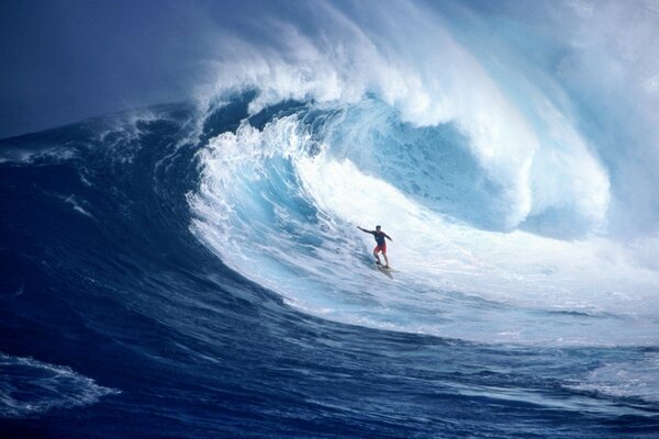 Surfing on the bright blue sea