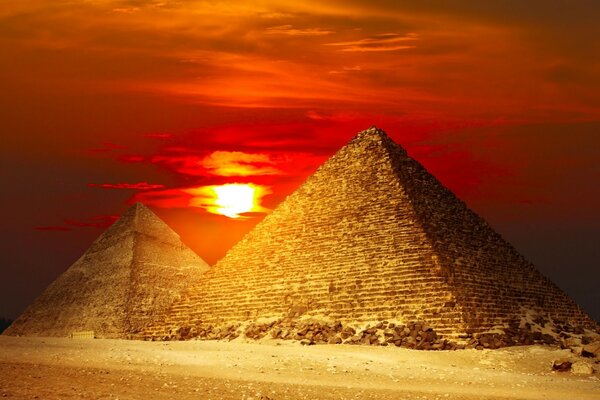 Famous pyramids on the background of sunset