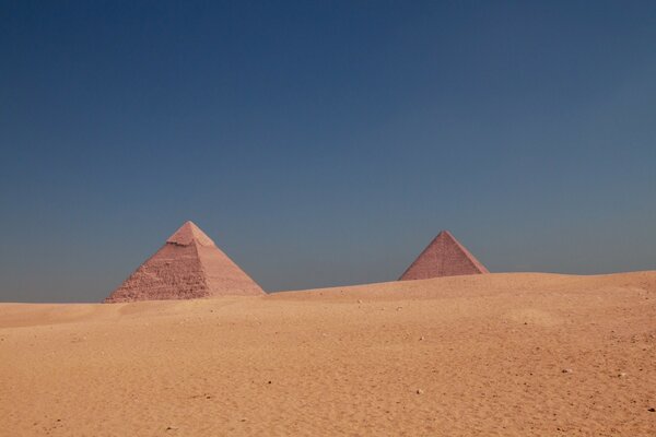 African pyramids on the background of sand