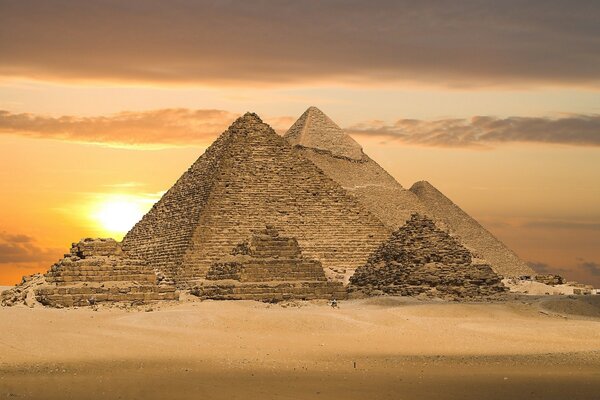 Egyptian pyramids on the background of sunset