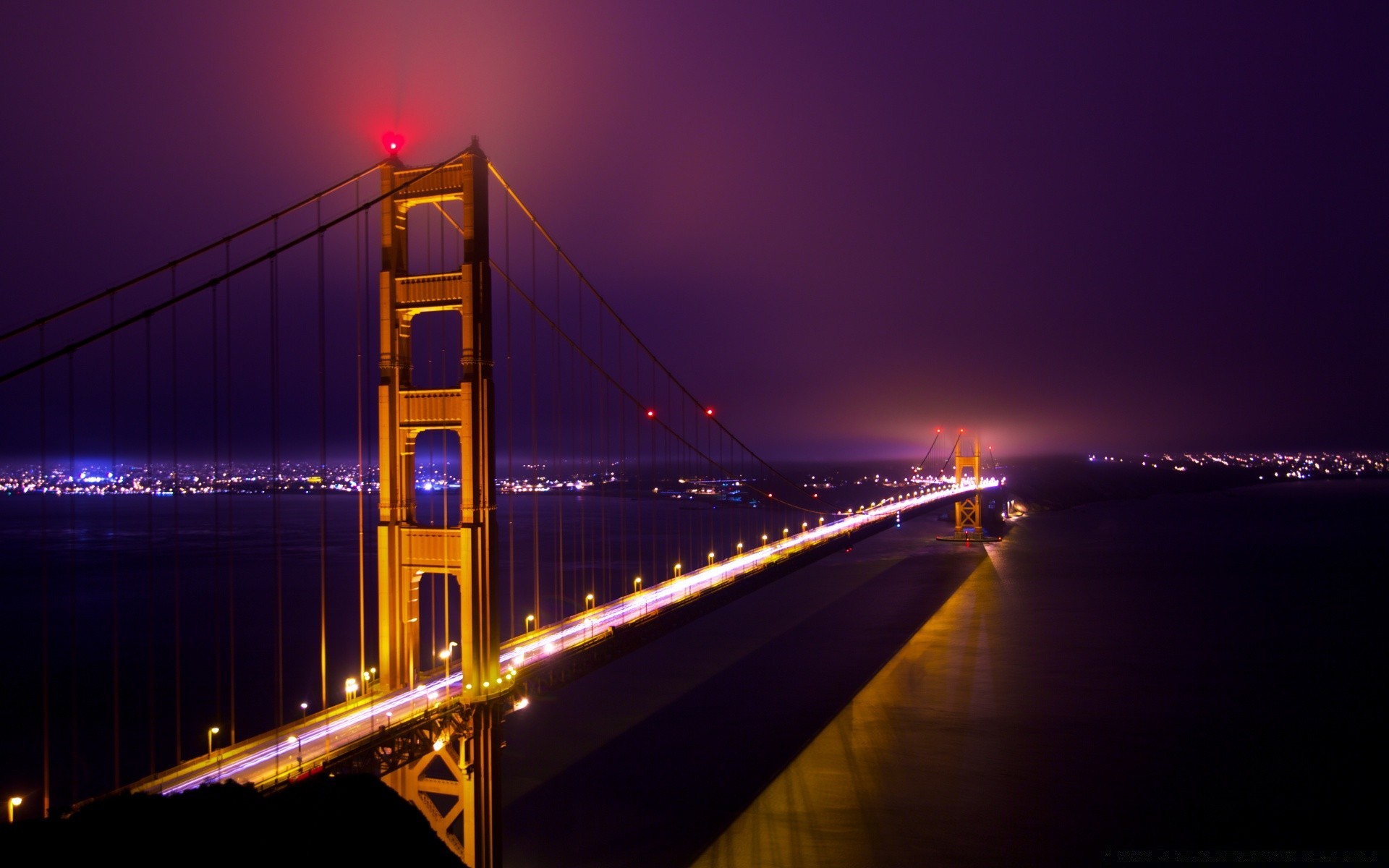 america bridge dusk evening sunset city transportation system water light architecture travel sky suspension bridge building reflection