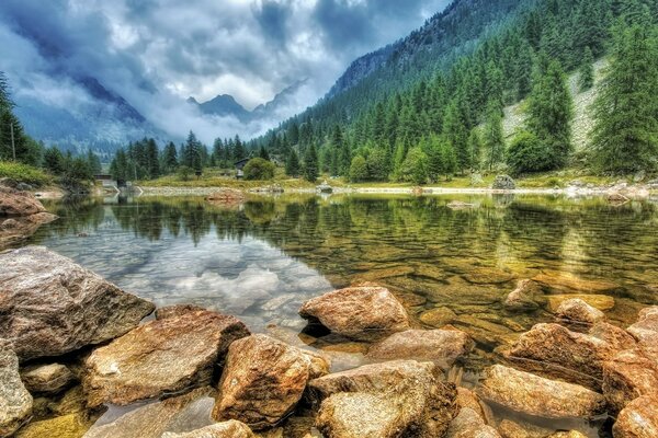 The reflection of the mountains in the mirror surface of the lake