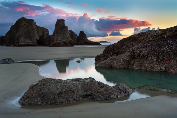 A deserted beach by the ocean