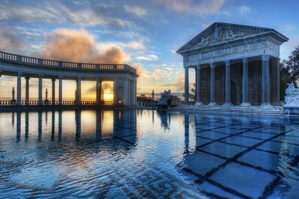 Reflection of architecture in water in America