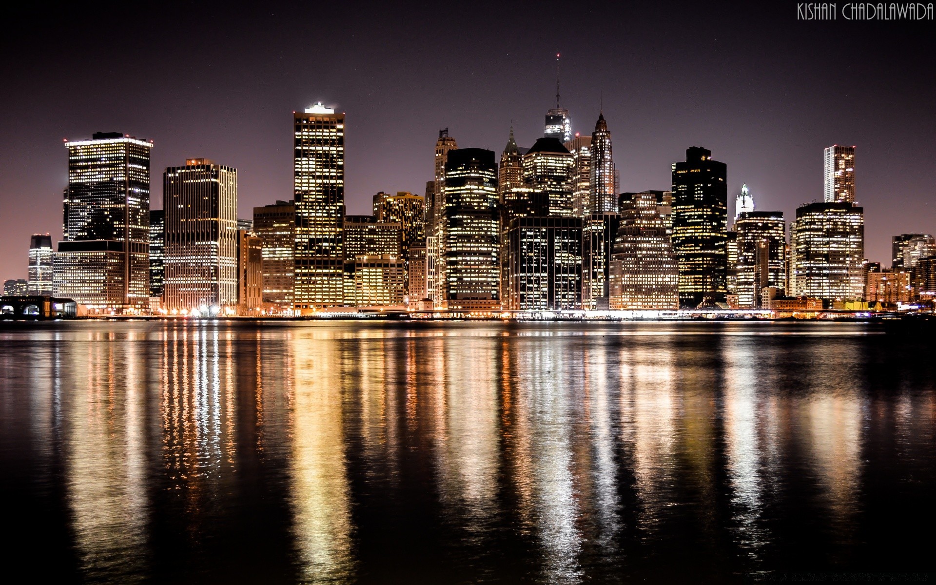 america city reflection skyline cityscape architecture downtown water skyscraper building urban travel waterfront river dusk sky sunset harbor tower modern bridge