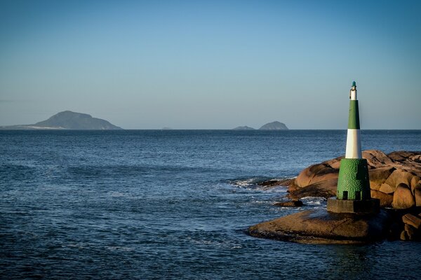 Lighthouse on a rocky and deserted shore