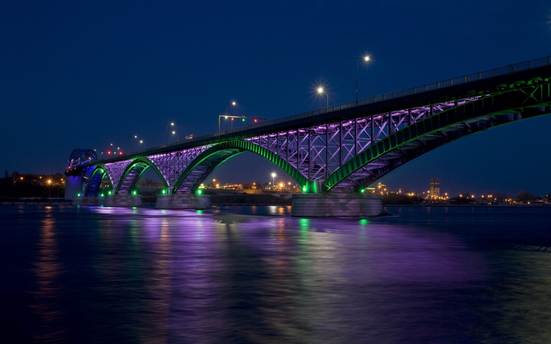 america bridge architecture water river city travel evening dusk connection suspension bridge traffic urban sunset sky transportation system cityscape blur building downtown