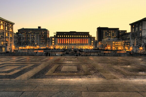 Buildings on the square during sunset