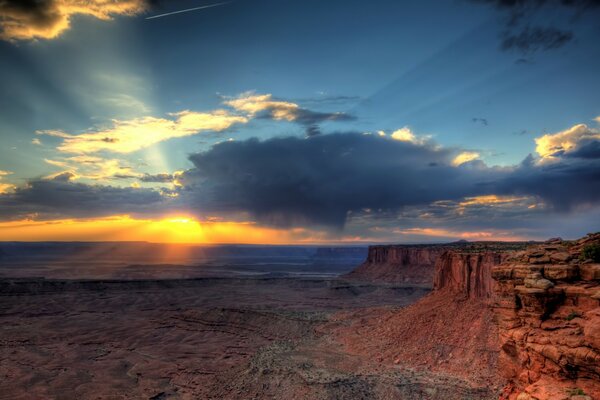 Sunset on the background of canyons in America