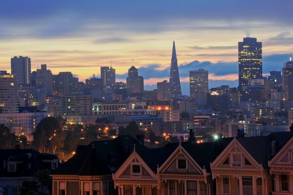 Twinkling lights on the background of sunset