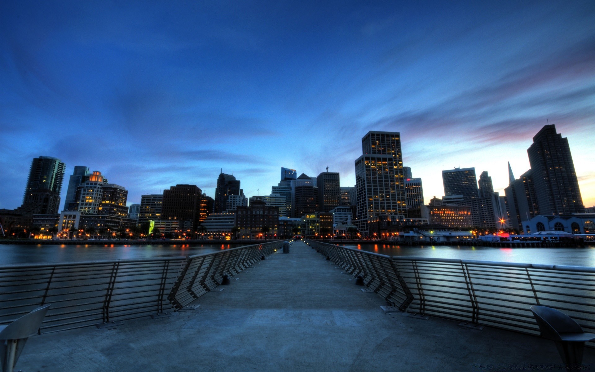 america city downtown skyline skyscraper travel cityscape dusk architecture evening sunset building urban bridge street sky reflection waterfront water traffic