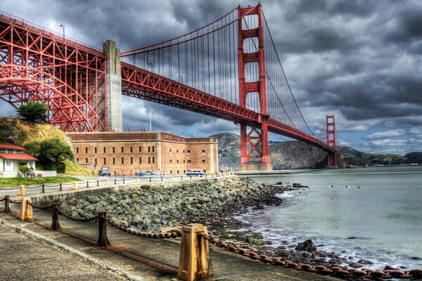 Beautiful bridge over the river in cloudy weather