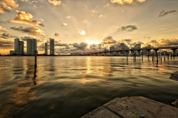 Dawn on the background of the city bridge