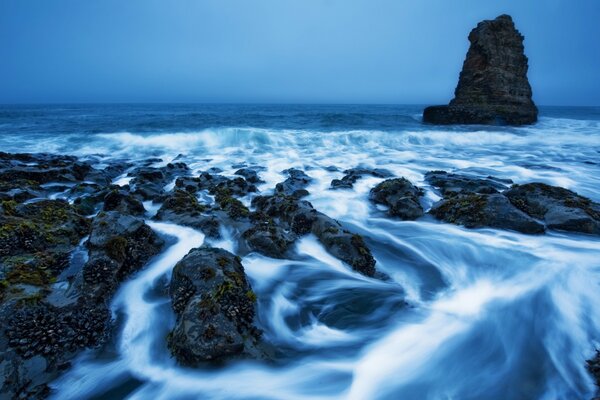 Blue waters of the twilight ocean