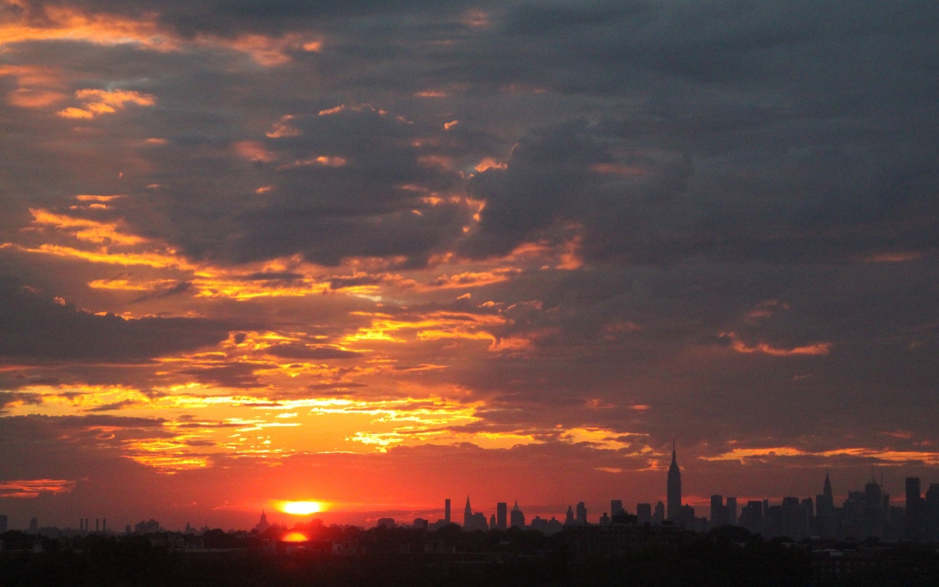 america sunset dawn evening dusk outdoors sky sun silhouette