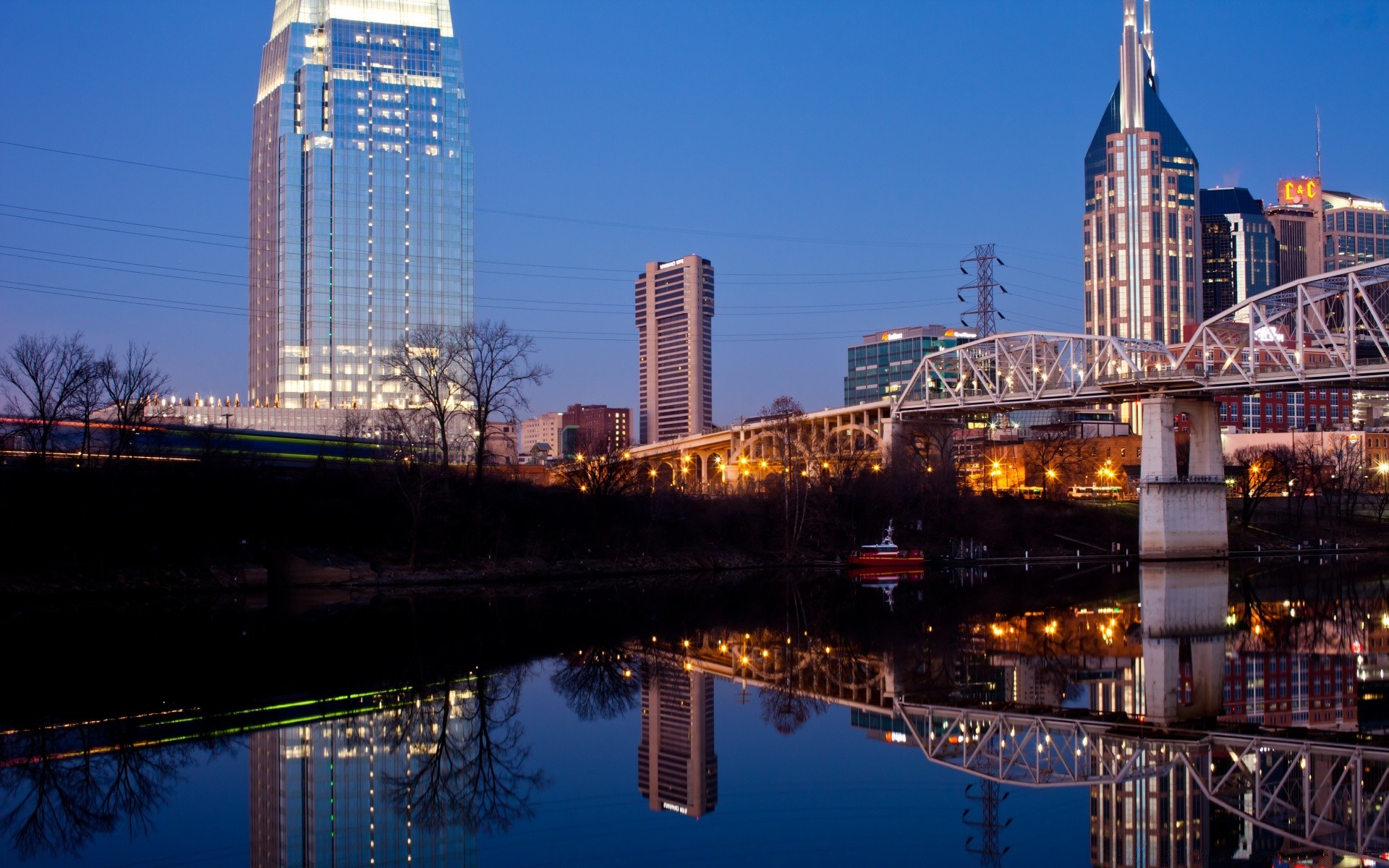 america architecture city building river travel cityscape skyscraper sky skyline dusk reflection water urban bridge modern office tower business downtown