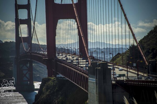 Heavy traffic on the bridge over the river