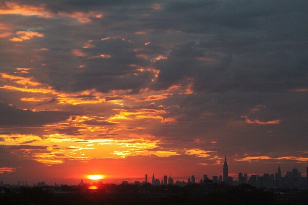 The evening twilight is located above the city