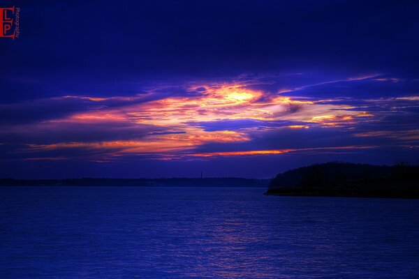 Sunset over calm waters