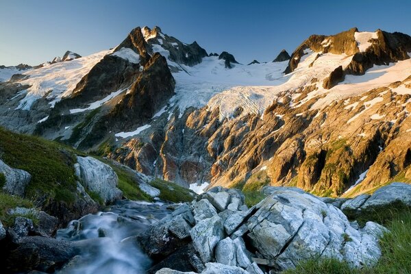 Mountain peaks looking into the sky