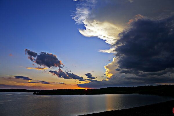 Evening sunset in black water