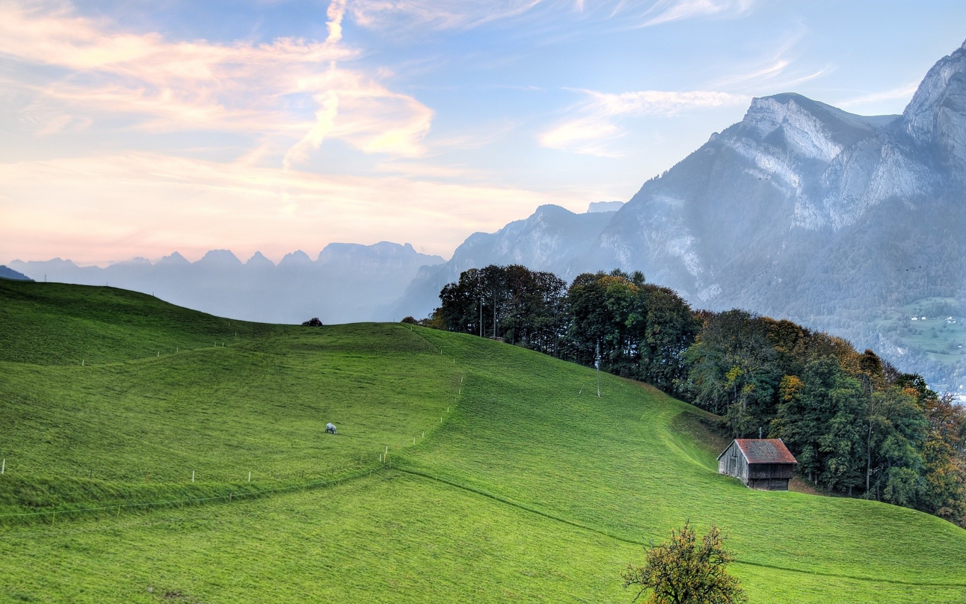 landschaft landschaft berge gras natur reisen hügel im freien himmel sommer tal heuhaufen landschaftlich baum landschaft ländlichen