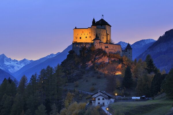 An ancient castle on the top of a mountain