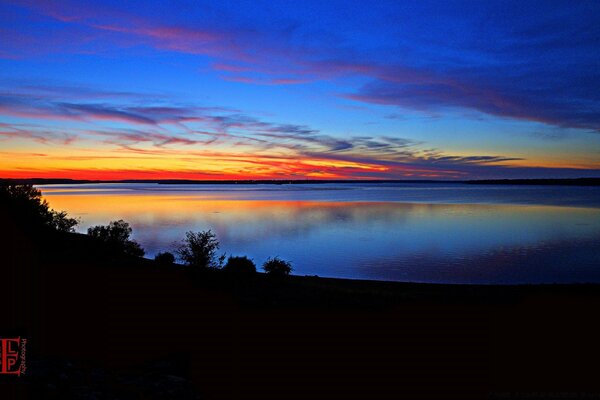 Beautiful sunrise on the lake shore