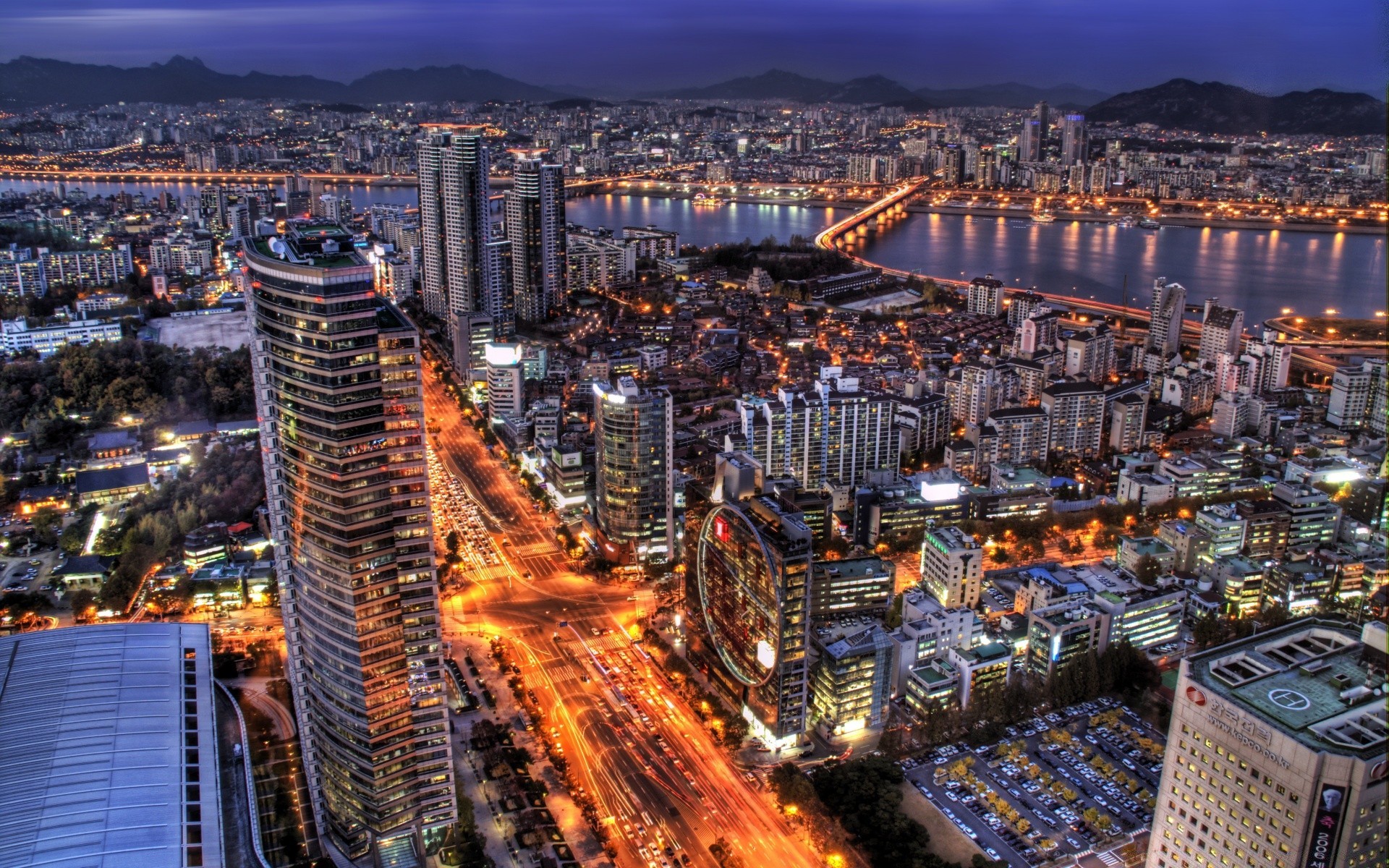 ásia cidade cidade skyline viagens urbano arranha-céu anoitecer arquitetura casa à noite centro da cidade espetáculo panorâmico antena ponto de interesse pôr do sol o negócio torre moderno água