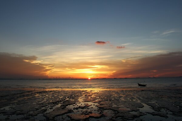 Beautiful sky over the water at dusk