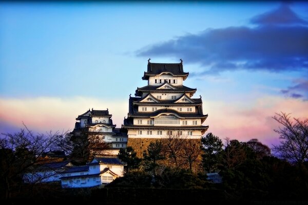 Asian multi-storey house on a blue sky background